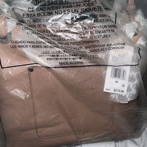 Never been use Michael kors purse